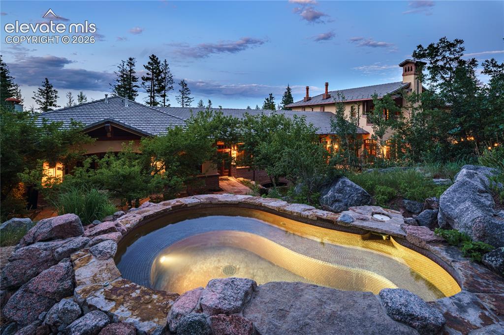 Image 28 of 49: Wonderful in ground Jacuzzi you are truly in the woods!