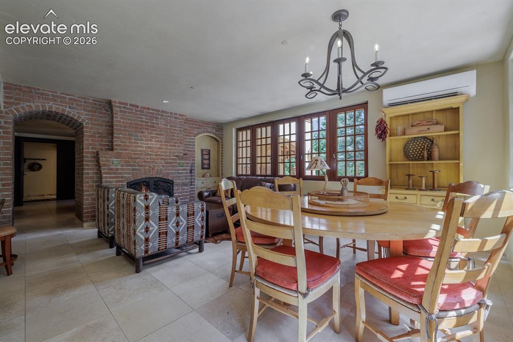 Image 37 of 49: Terrace of the kitchen with gas firepit