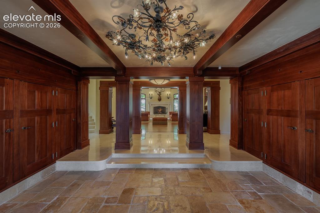 Image 8 of 49: Jerusalem stone in entry way and main garage walk way into the home. Pivoti