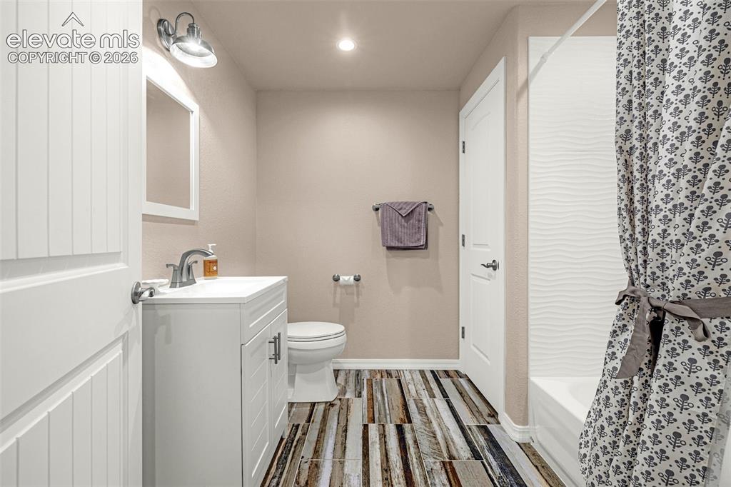 Image 32 of 48: Basement Full Bath with Linen Closet