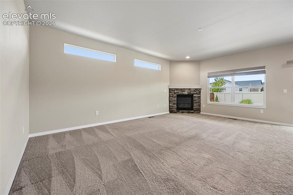 Image 11 of 44: Living Room looking toward kitchen