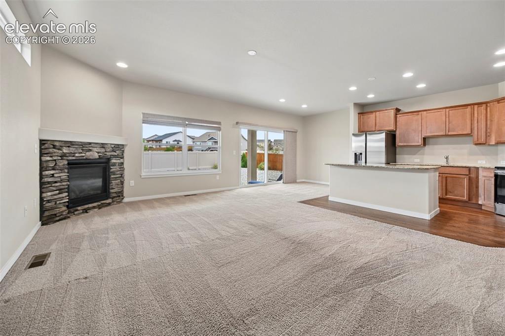 Image 12 of 44: Living Room with Fireplace