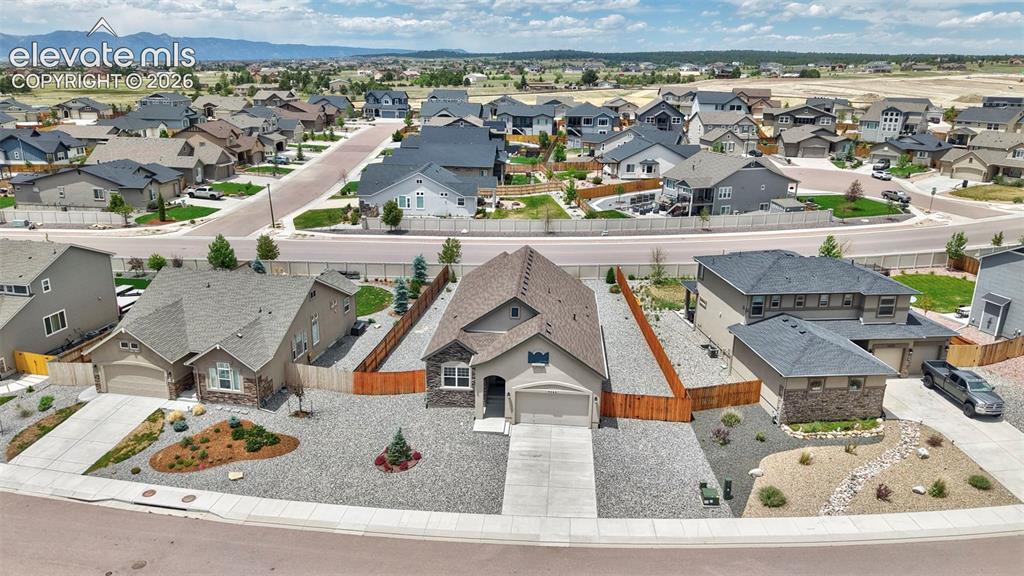 Image 36 of 44: Aerial View of Back Yard