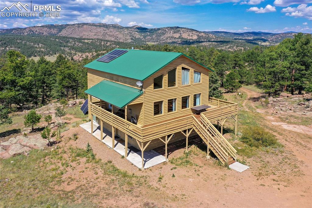 Image 41 of 48: Front View Of Home - Expansive Deck