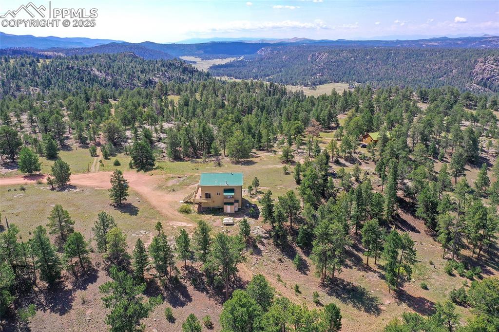 Image 47 of 48: Aerial Of Subject Property, Shows Back Of Home  