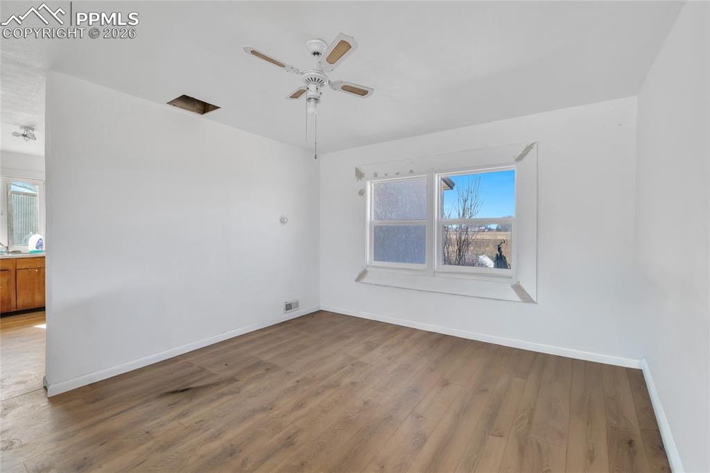 Image 38 of 49: ADU Kitchen featuring freestanding refrigerator, stainless steel electric r