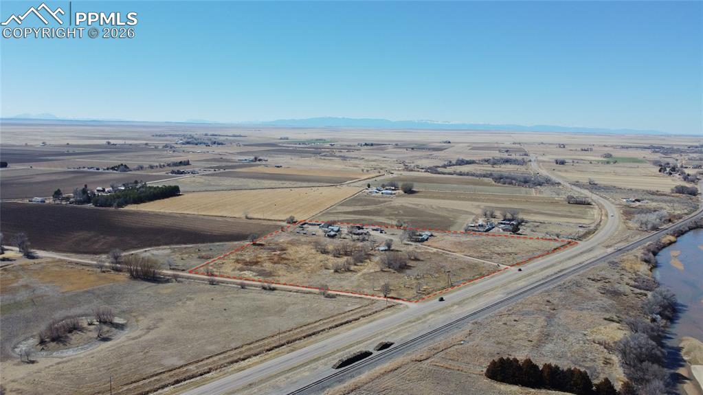 Image 45 of 49: View of yard featuring an outbuilding
