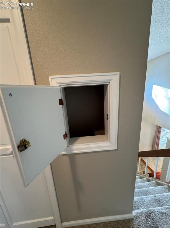 Image 37 of 48: Laundry Shoot outside Primary Bedroom Suite.