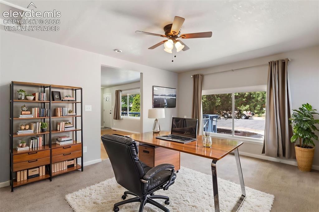 Image 5 of 21: Virtually Staged as an office. This room has its own outside door