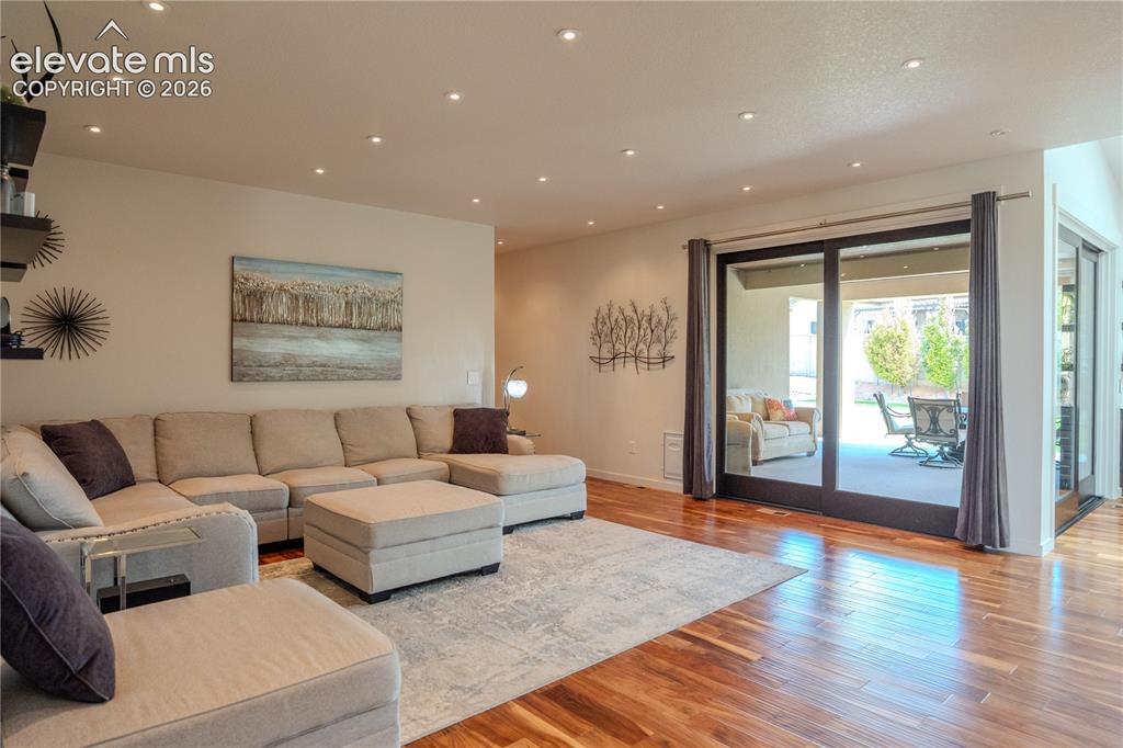 Image 19 of 50: The full corner glass doors gives you the feeling of being outside plus giv