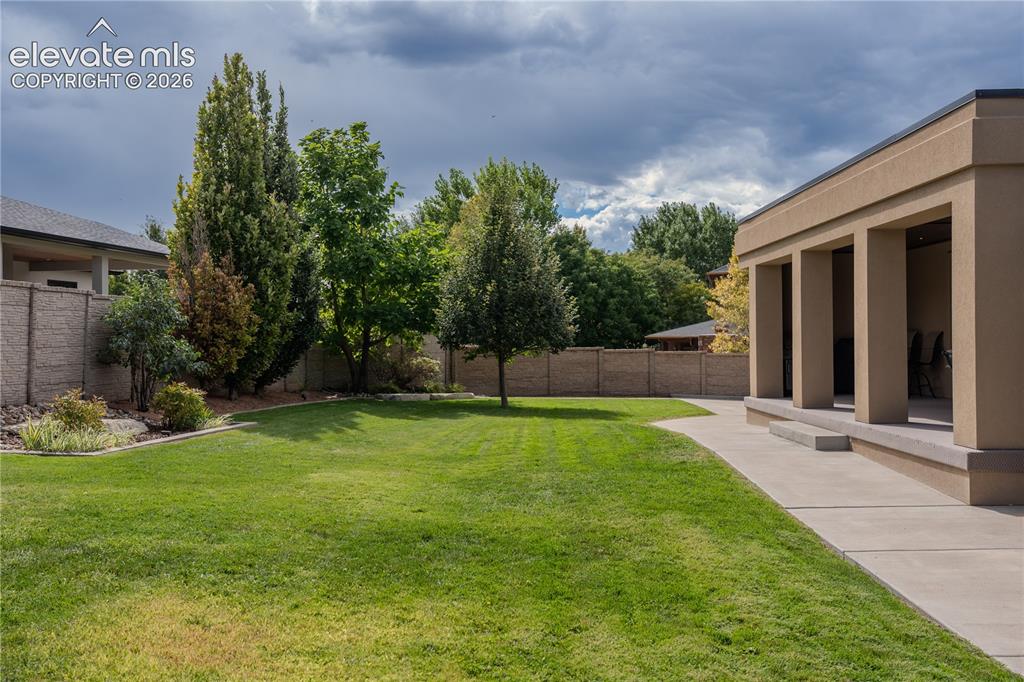 Image 47 of 50: With a privacy fence all the way around and a 1/3 of an acre, this back yar