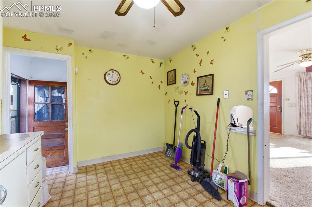 Image 13 of 35: Exercise room featuring ceiling fan and light floors