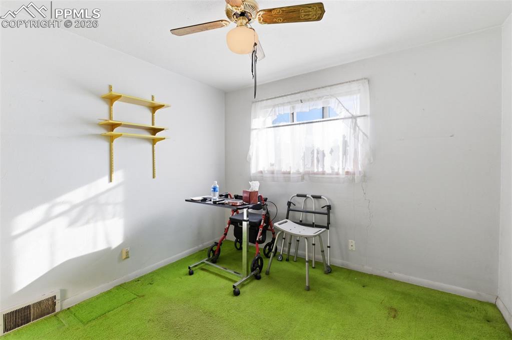 Image 18 of 35: Playroom featuring carpet flooring and a ceiling fan