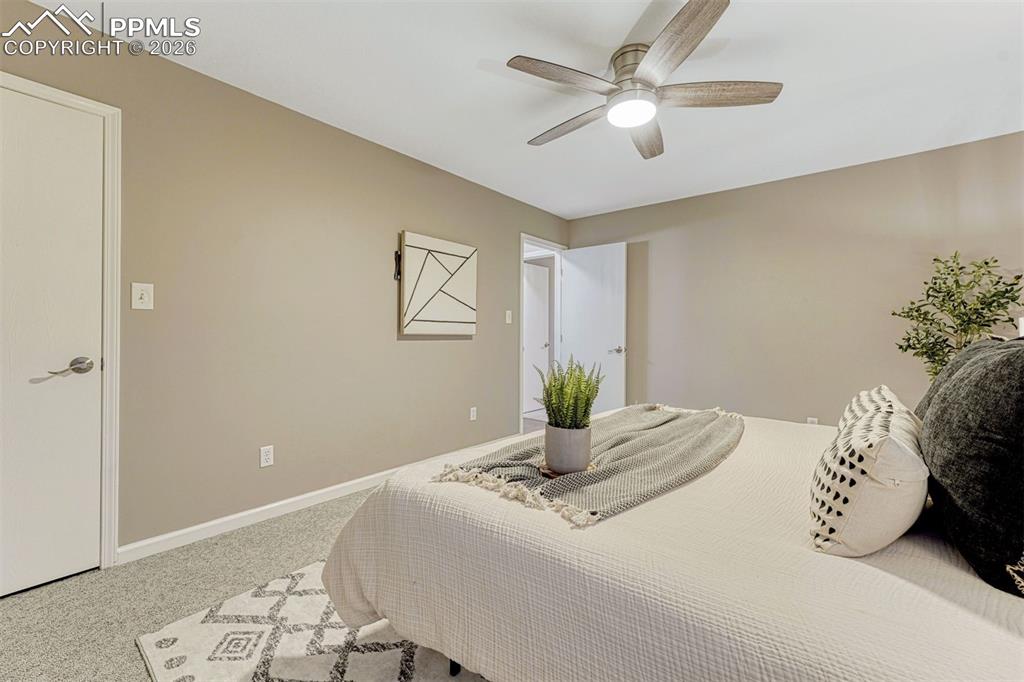 Image 25 of 49: Primary bedroom with walk in closet