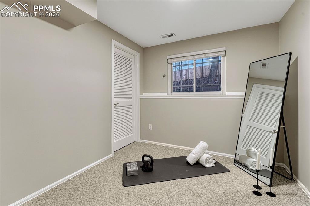 Image 32 of 49: Garden level, non conforming 5th bedroom