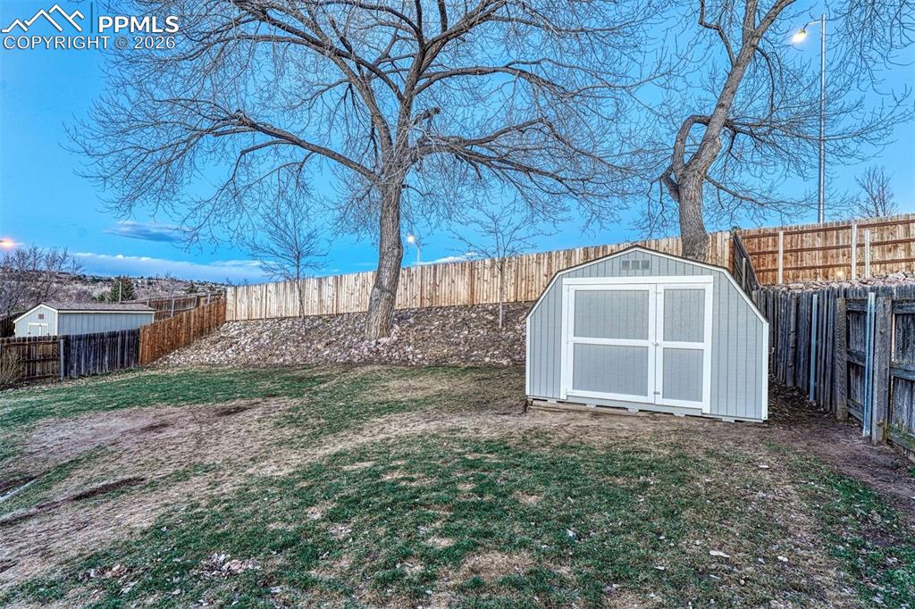 Image 37 of 49: Rear fence is double picketed with steel supports
