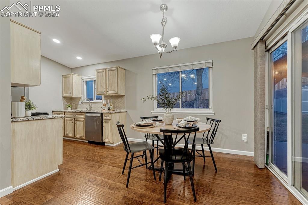 Image 4 of 49: Dining room with walkout to patio