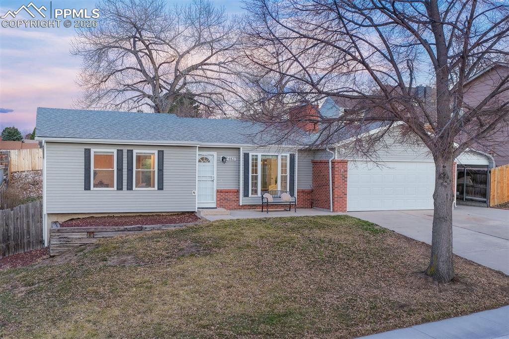 Image 42 of 49: Beautiful from yard and patio