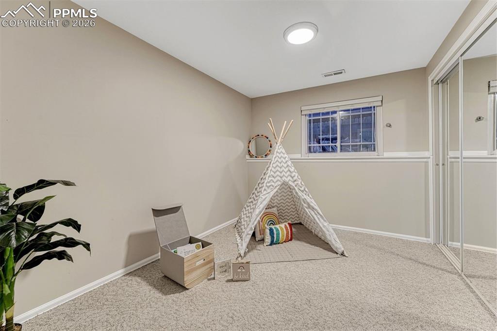 Image 9 of 49: Garden level bedroom