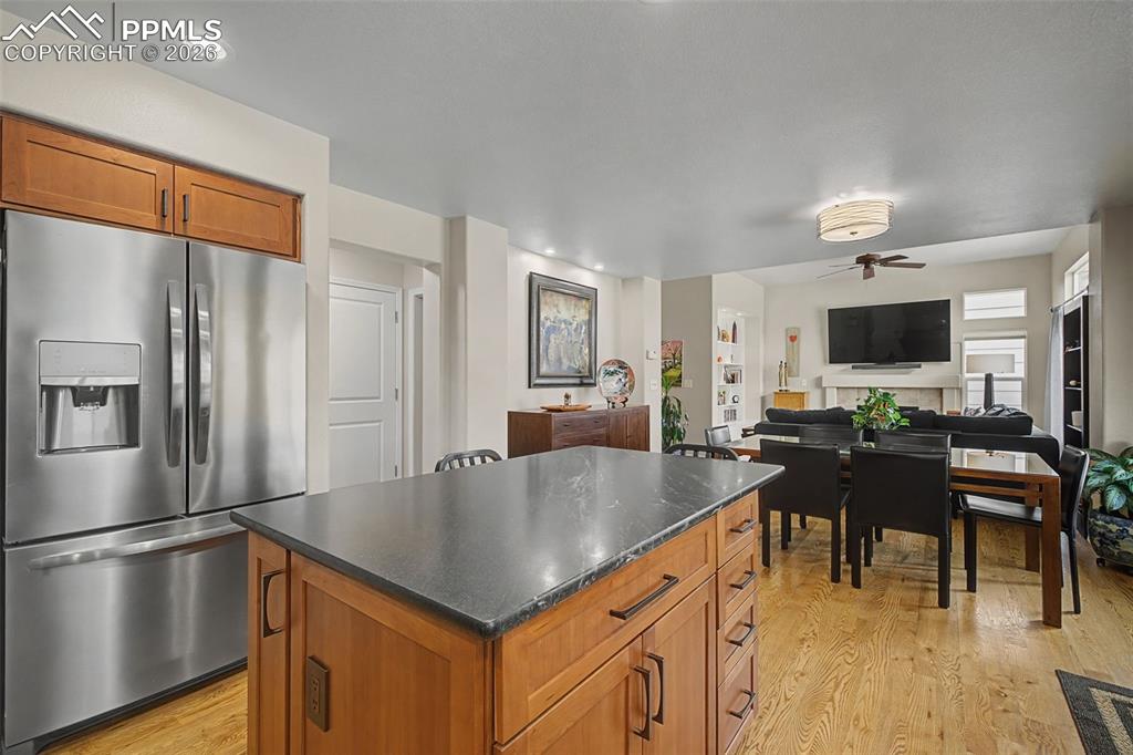 Image 18 of 50: Custom remodeled kitchen featuring a corner pantry and large island!