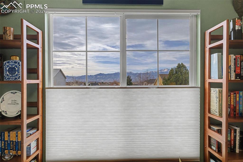 Image 26 of 50: Incredible mountain views from the front bedroom window!