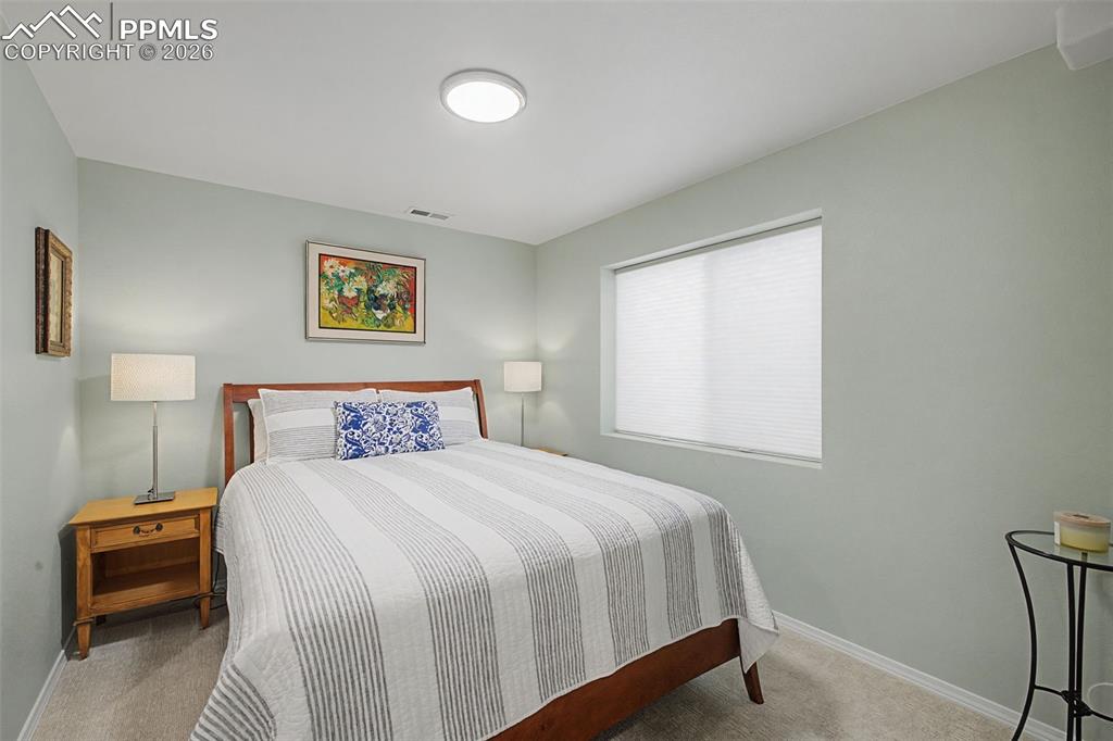 Image 31 of 50: Basement bedroom.