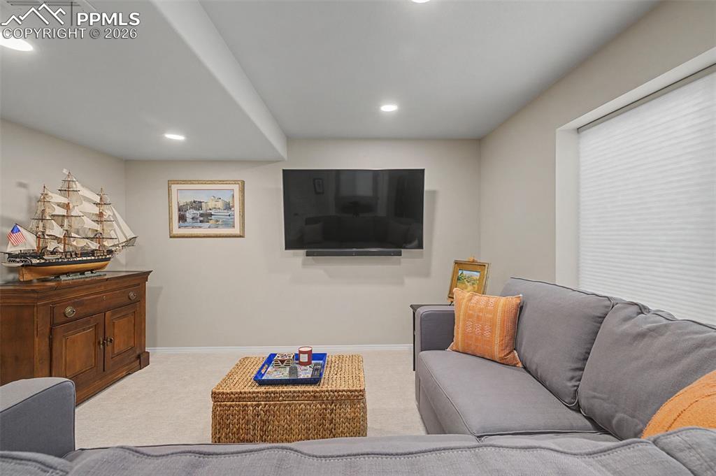 Image 35 of 50: Basement living room.