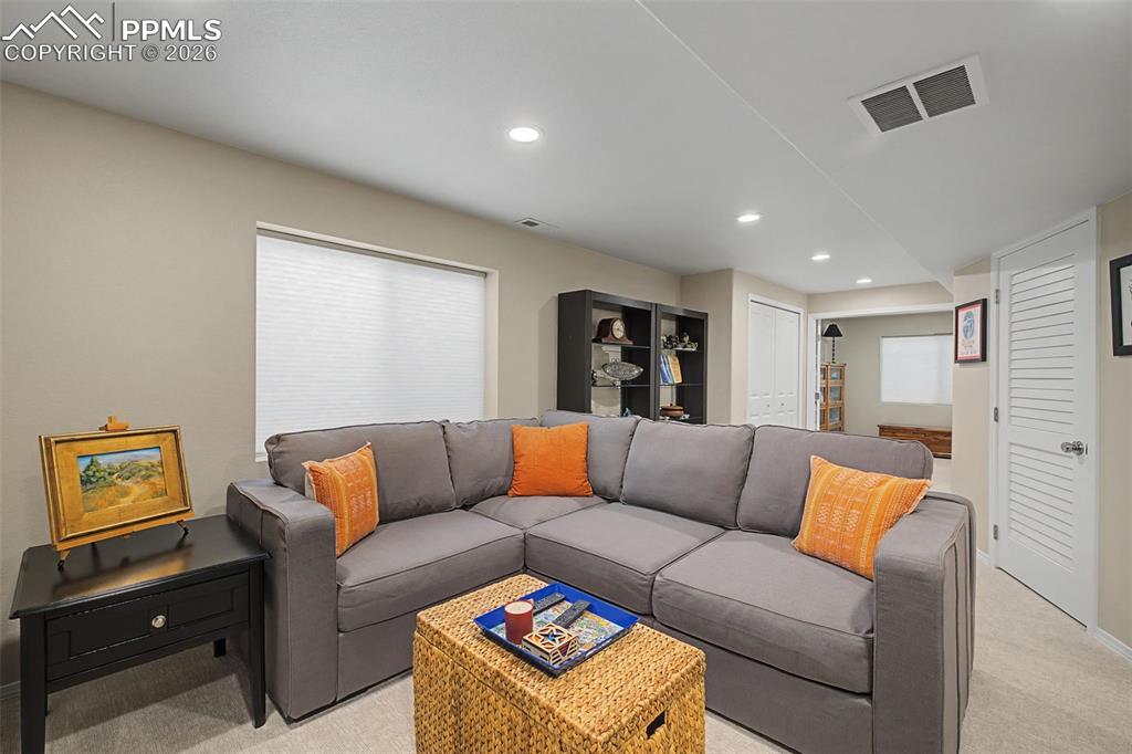 Image 36 of 50: Basement living room.