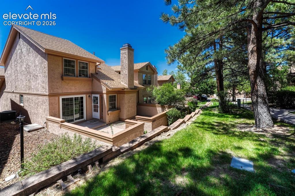 Image 1 of 48: Beautifully maintained end-unit townhome nestled in the tranquil community