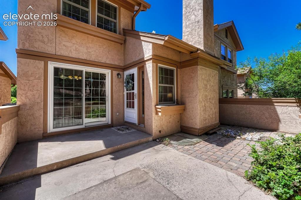 Image 15 of 48: Spacious front courtyard, ideal for outdoor dining, entertaining, and soaki