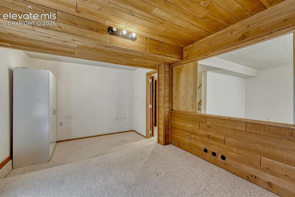 Image 41 of 48: Basement bedroom #3 is a versatile room that expands your living space that