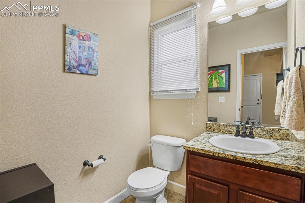 Image 11 of 31: 1/2 bathroom on main