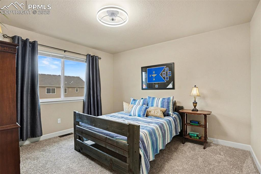 Image 16 of 31: 3 secondary bedrooms upstairs, 2 of which also have walk-in closets!