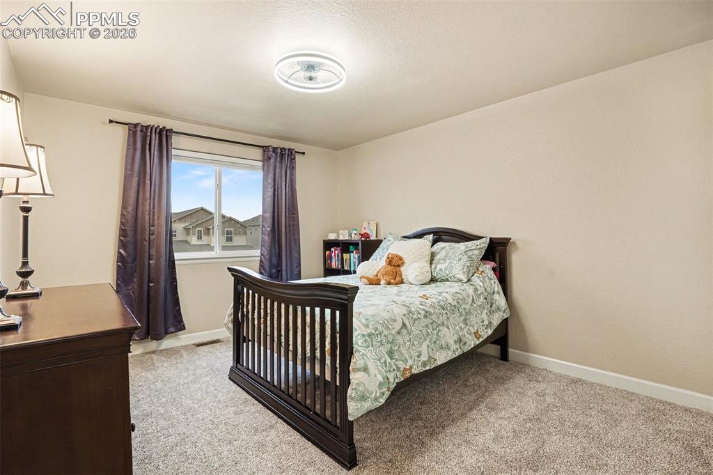 Image 17 of 31: 3 secondary bedrooms upstairs, 2 of which also have walk-in closets!