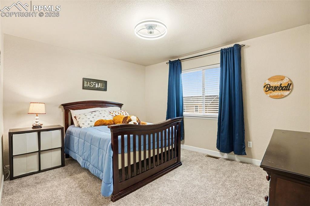 Image 18 of 31: 3 secondary bedrooms upstairs, 2 of which also have walk-in closets!