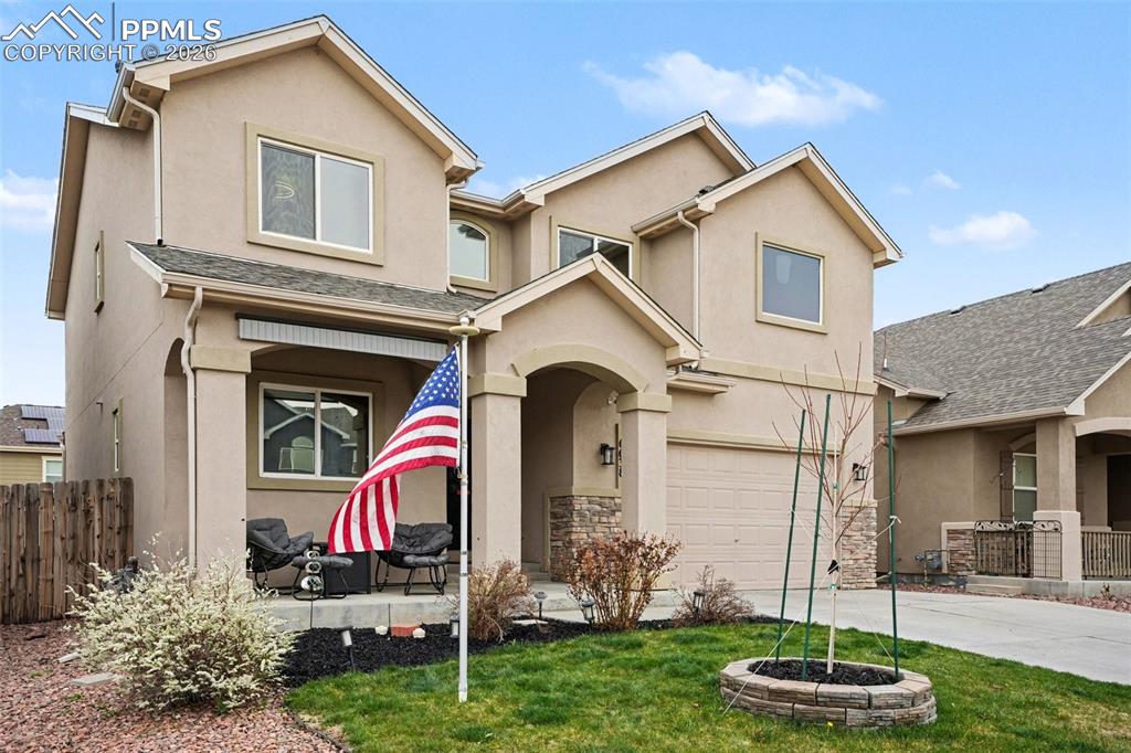 Image 2 of 31: Large covered patio and fully landscaped!