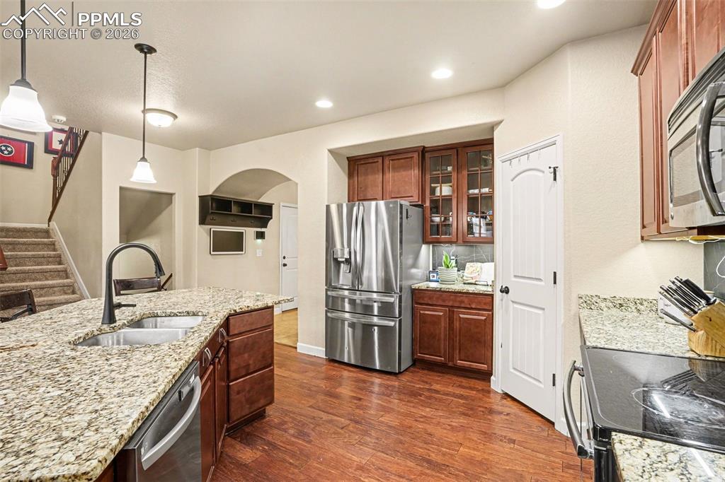 Image 7 of 31: Wood floors, granite counters