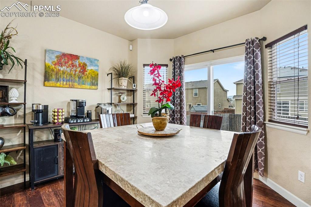 Image 9 of 31: Dining area next to open kitchen