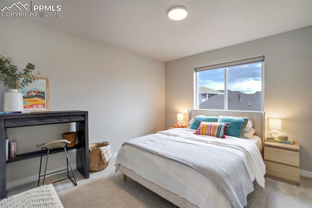Image 20 of 47: Carpeted bedroom featuring baseboards