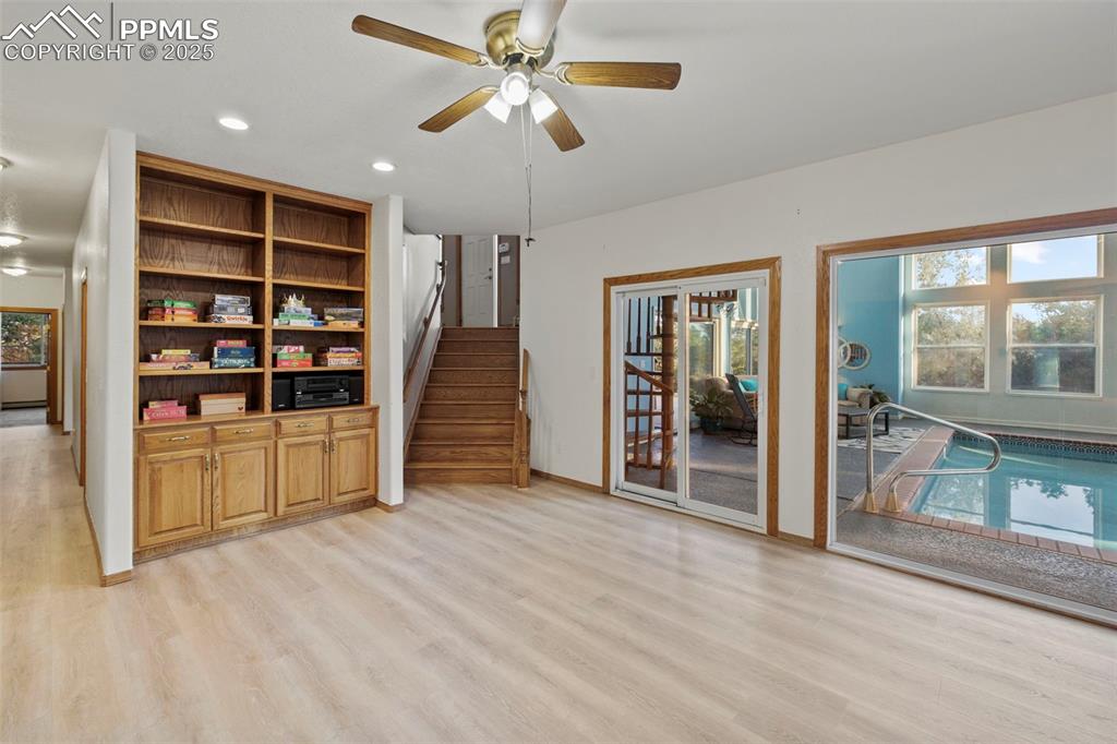 Image 36 of 50: Unfurnished living room featuring recessed lighting, healthy amount of natu