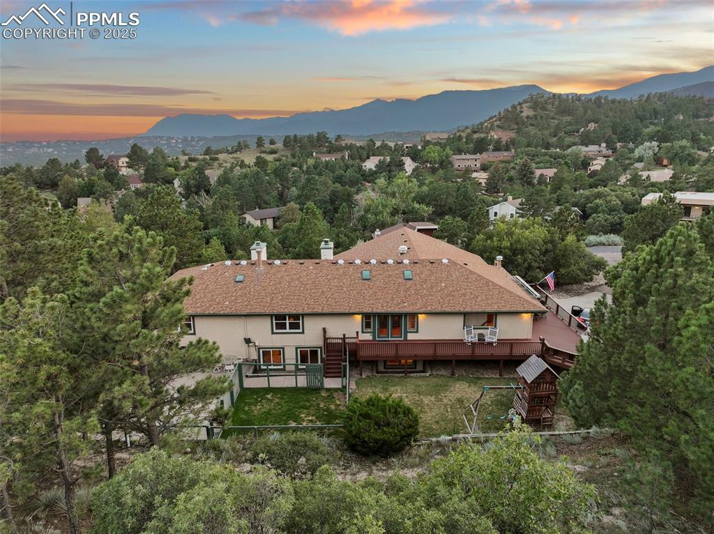 Image 46 of 50: Aerial view at dusk of a mountain view
