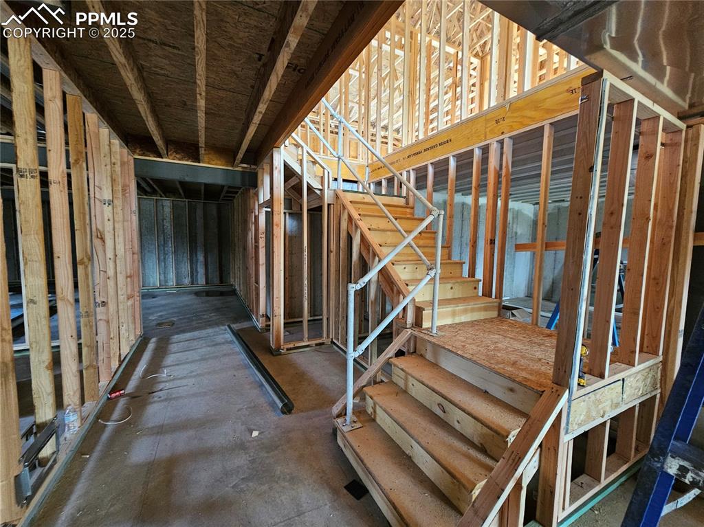 Image 13 of 16: Basement featuring stairway