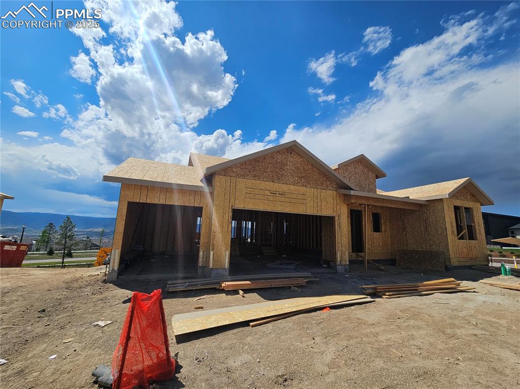 Image 2 of 16: View of front of home with a mountain view