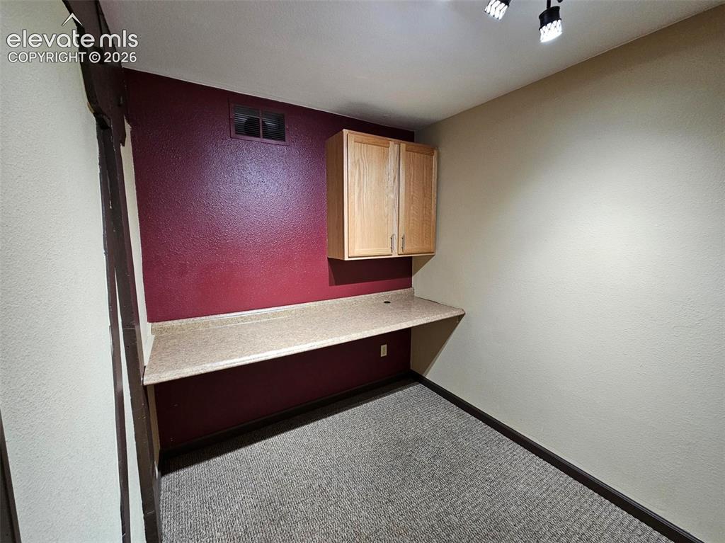 Image 5 of 11: Breakroom with counter