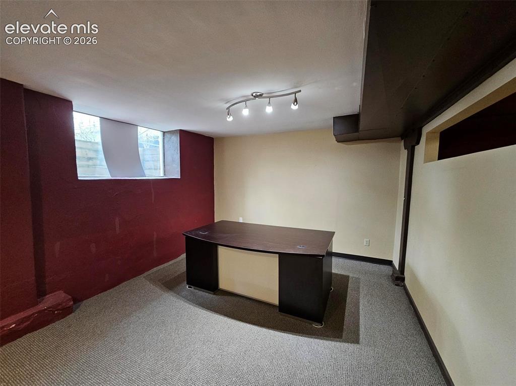 Image 6 of 11: Office with executive desk