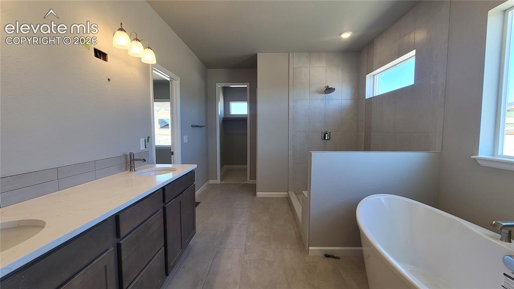 Image 12 of 29: Master Bathroom
