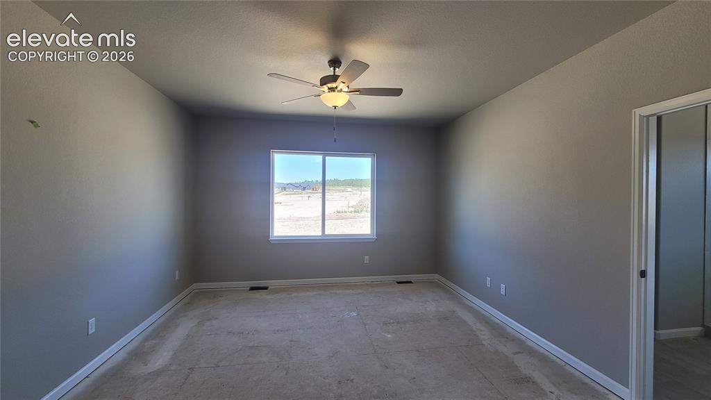 Image 8 of 29: Great Room with engineered wood flooring, floor outlet, ceiling fan, LED li