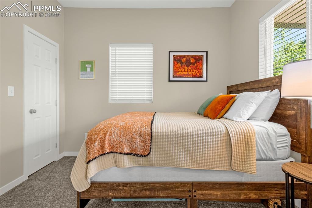 Image 17 of 36: Bedroom featuring carpet and baseboards