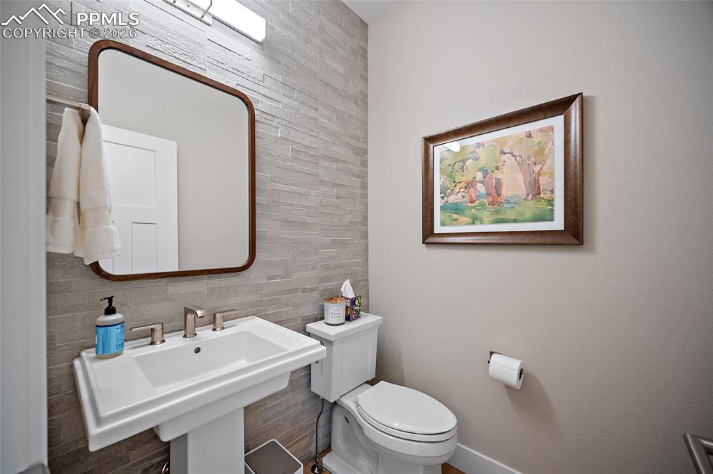 Image 27 of 50: Powder room on main level. 