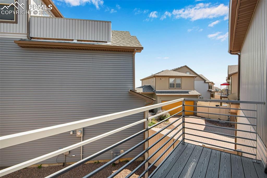 Image 16 of 39: View of the wooden terrace off the kitchen